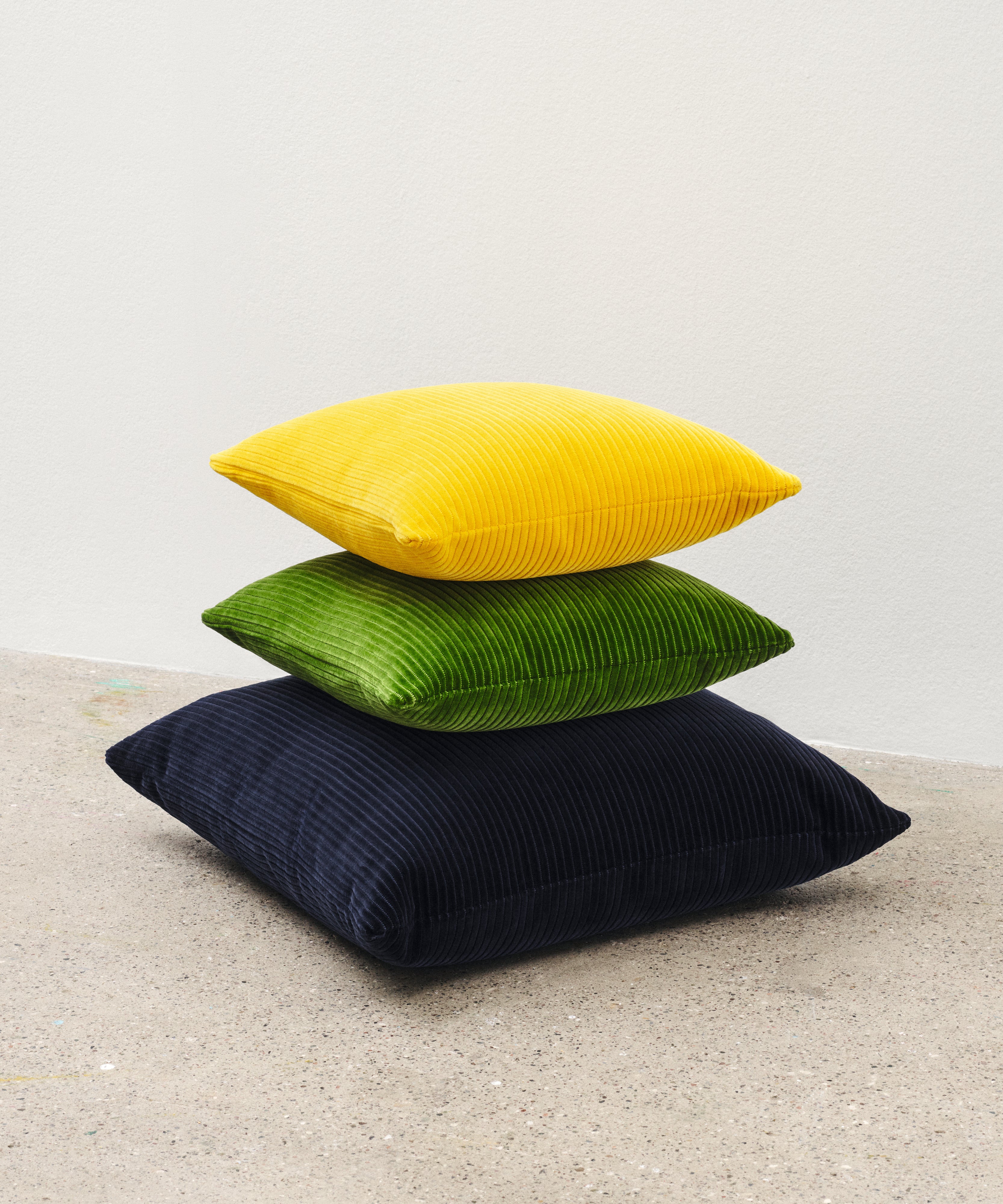 Kvadrat Raf Simons cushion stack. Phlox in Yellow, Green and Dark Blue