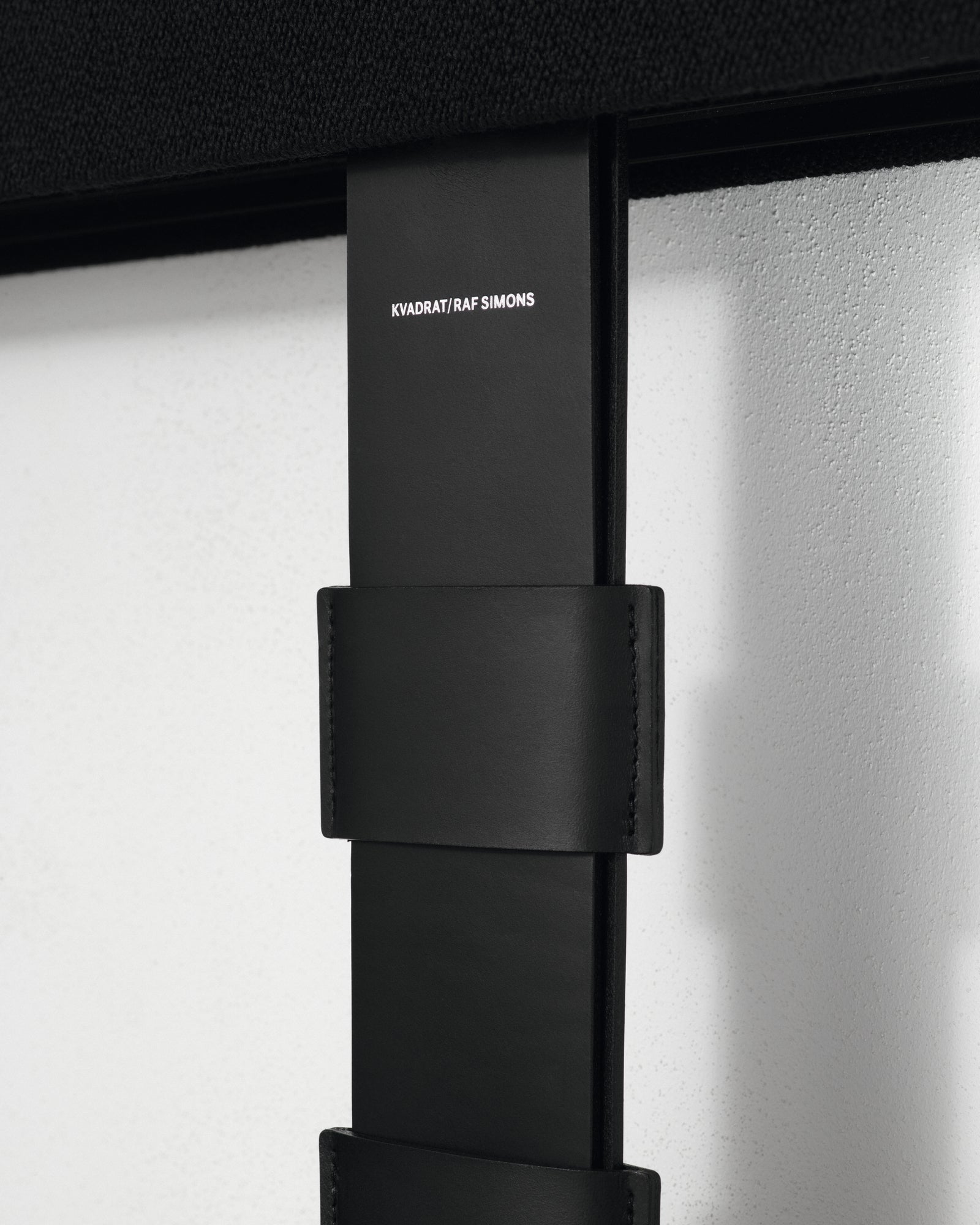 kvadrat raf simons black leather magazine strap