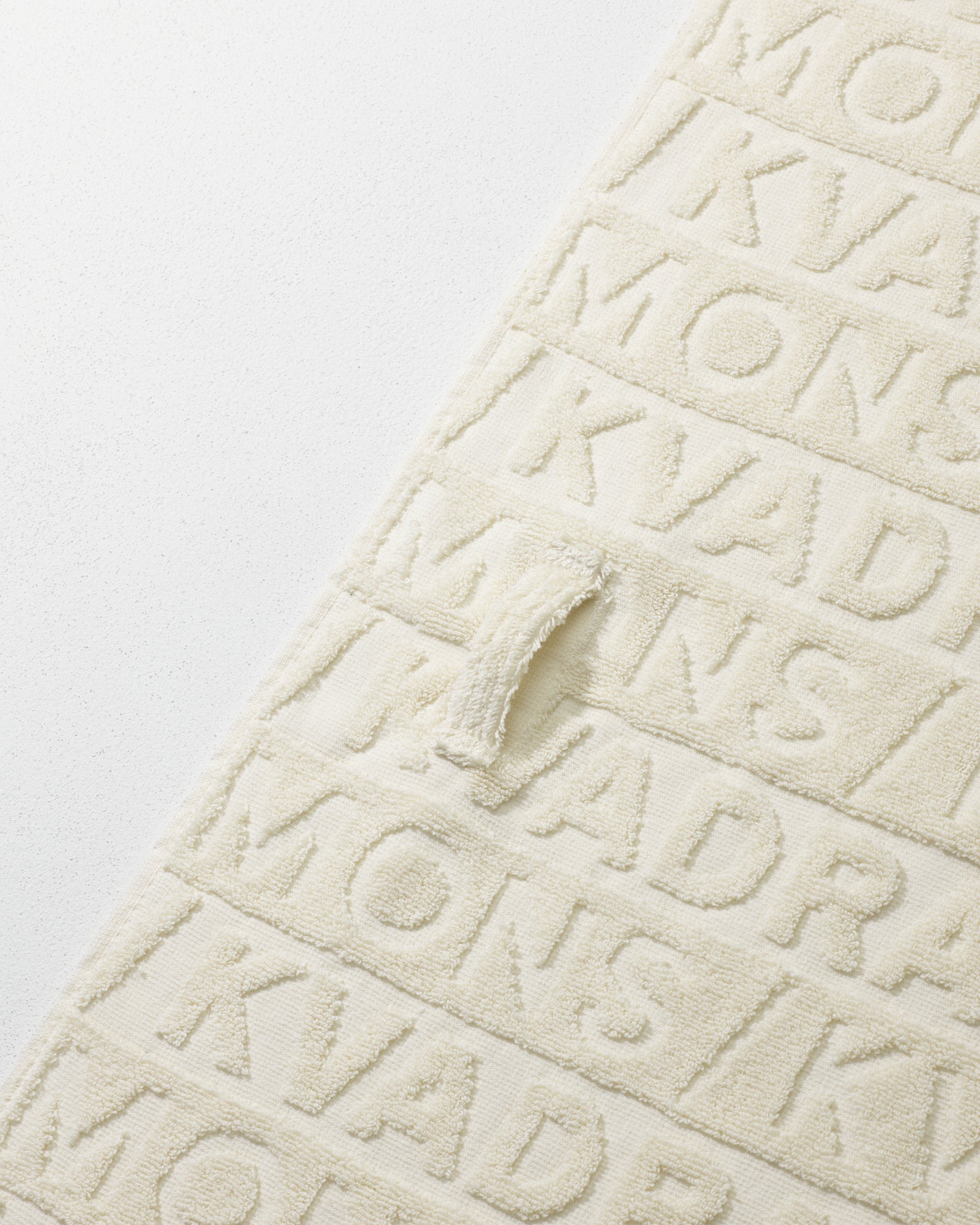 Kvadrat Raf Simons Beach Towel in Off White. Detail image.