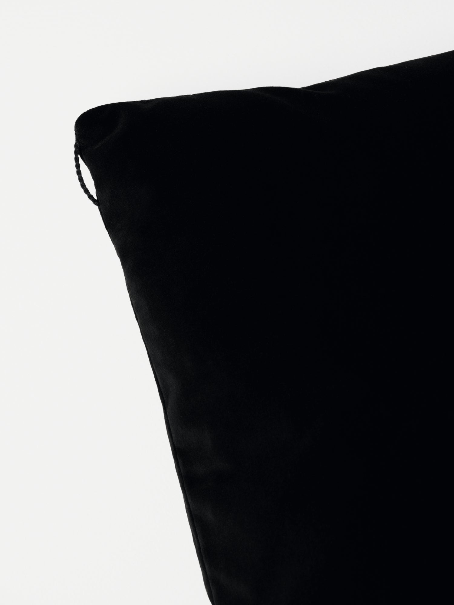 Kvadrat Raf Simons Kids Collection Asator Velvet Cushion in Raven Black. Detail image