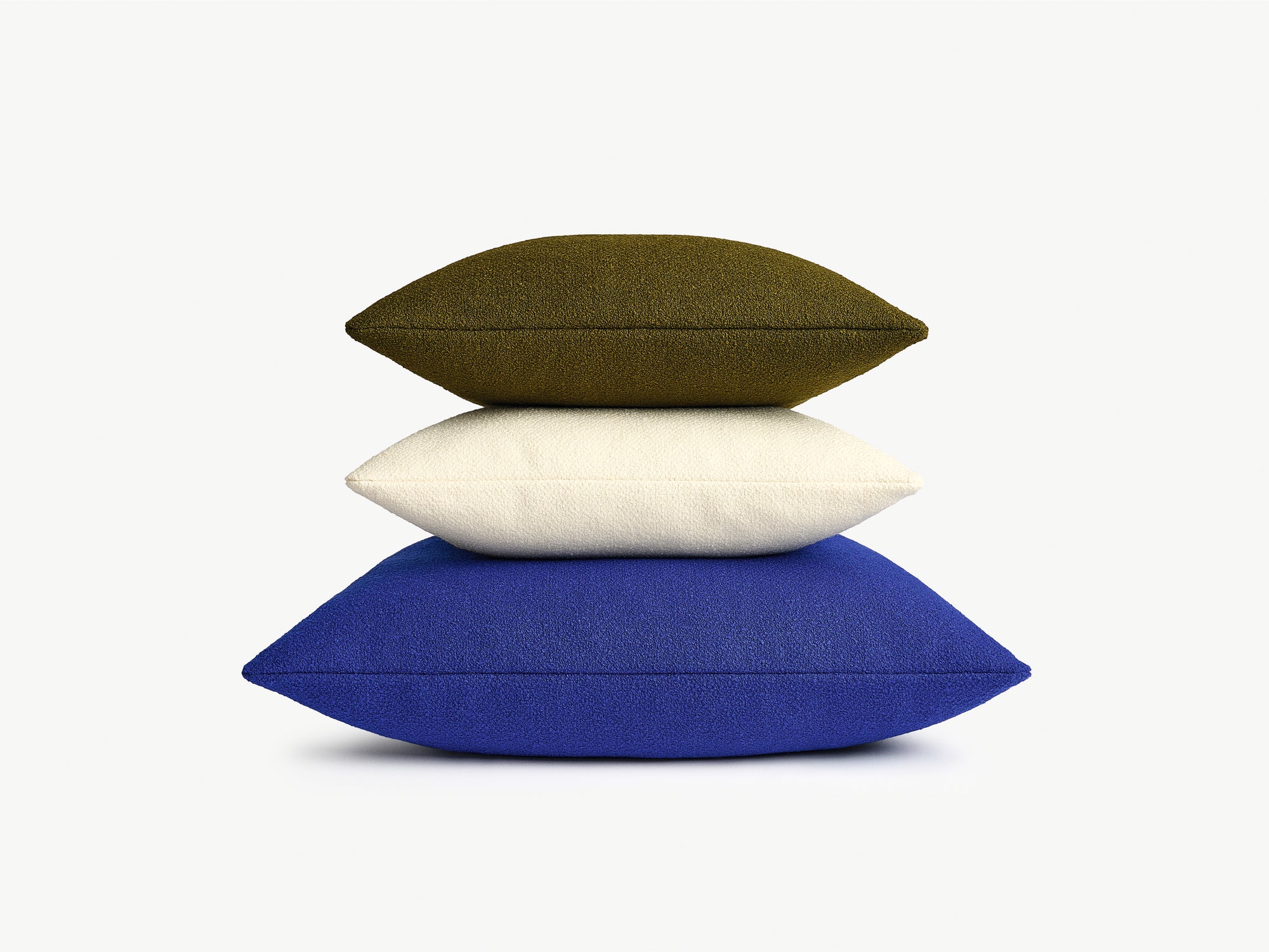 Kvadrat Raf Simons Cushion stack in Saxion Brown, Off White and Blue. 